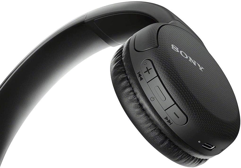 Sony WH-CH510 wireless headphones with a sleek black on-ear design, featuring padded ear cups and a minimalist look, displayed on a wooden table. The headphones showcase Bluetooth connectivity, built-in microphone, and long battery life for hands-free calling and music streaming.